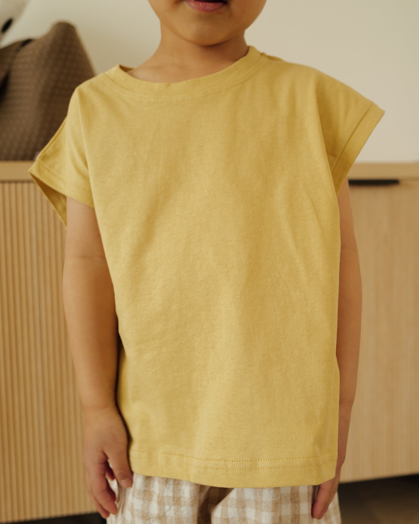 boy in cut off tee dijon