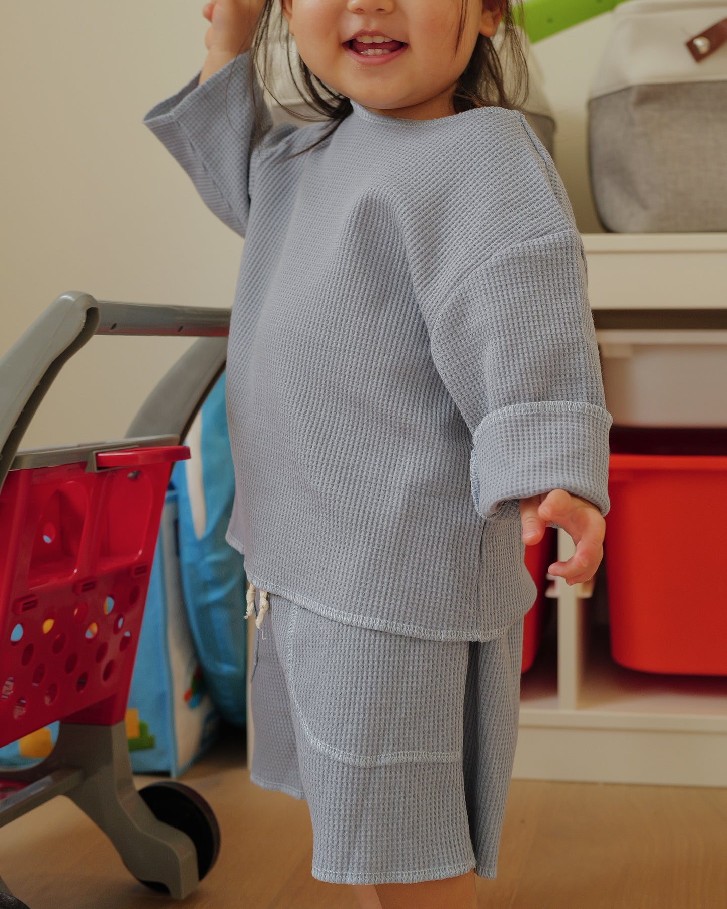 girl in waffled overlock stitched top