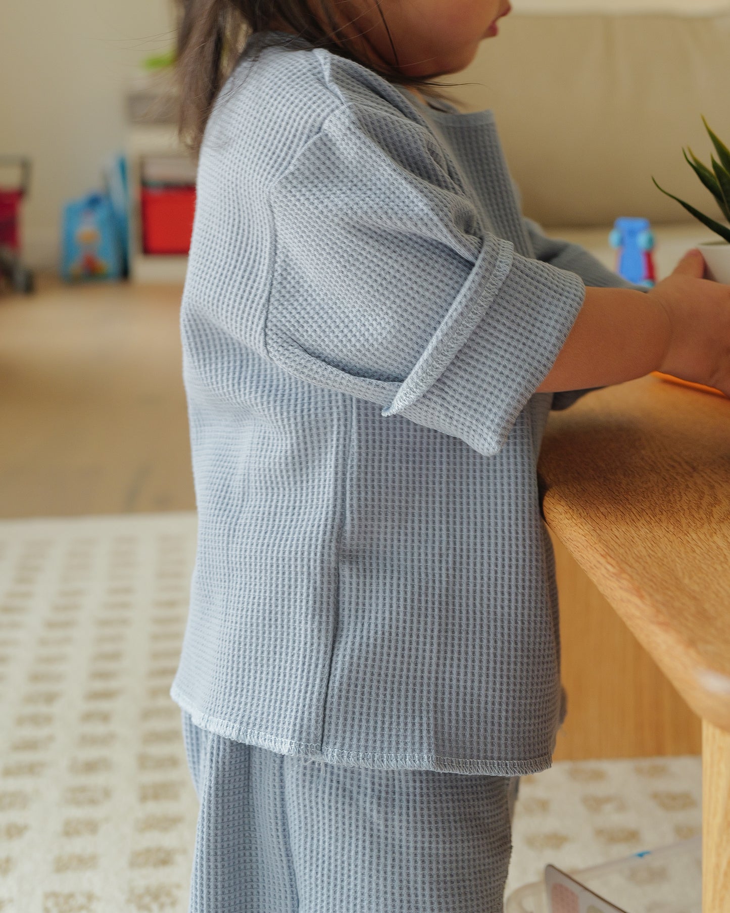 girl in waffled overlock stitched top 2