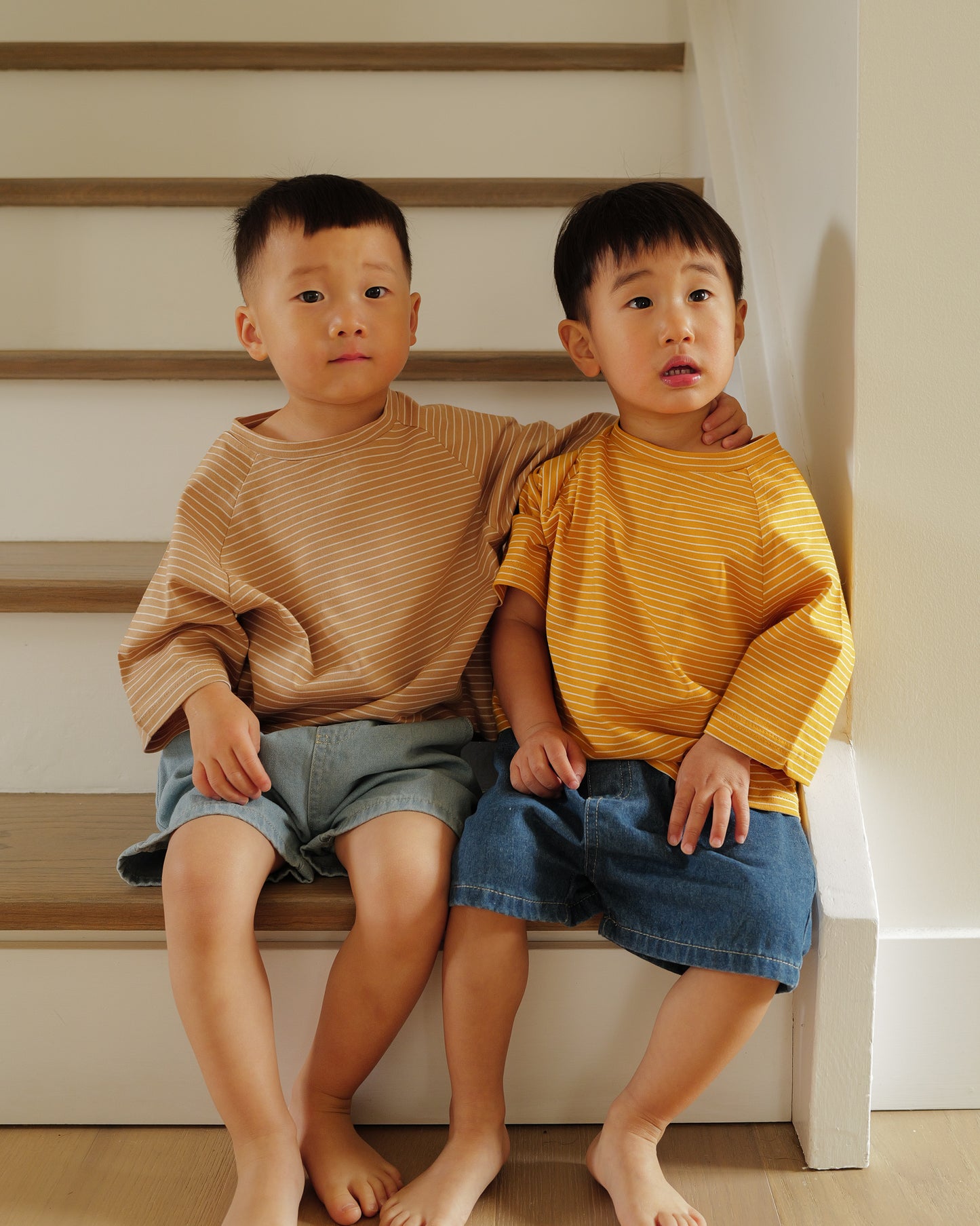 toddler boys in pinstriped tee