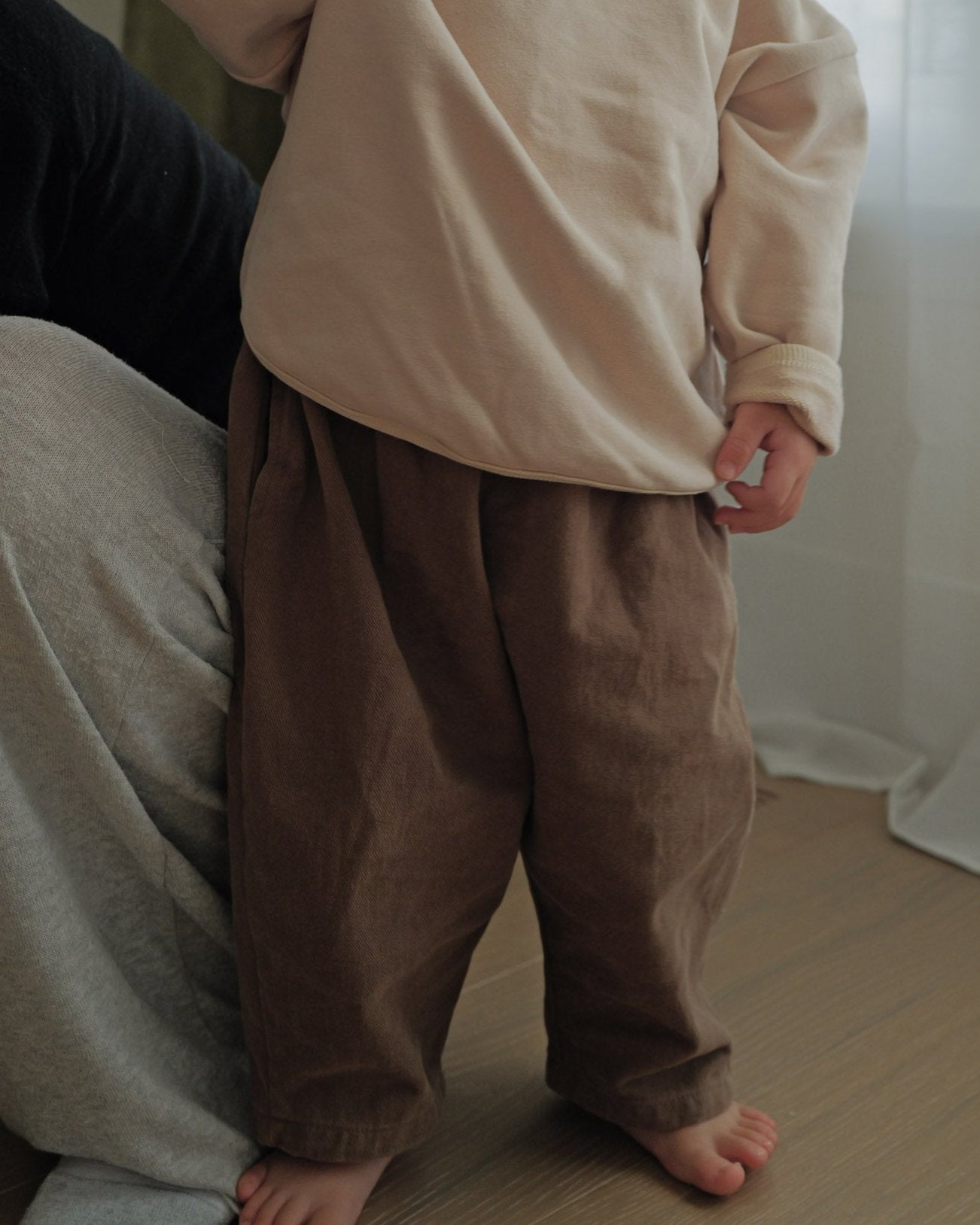 toddler wearing oori noa's barrel cotton pants