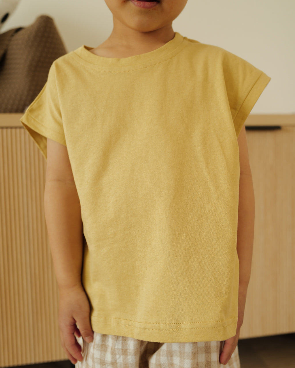 boy in cut off tee dijon