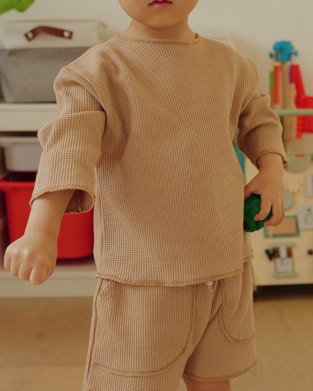 boy in waffled overlock top brown 2