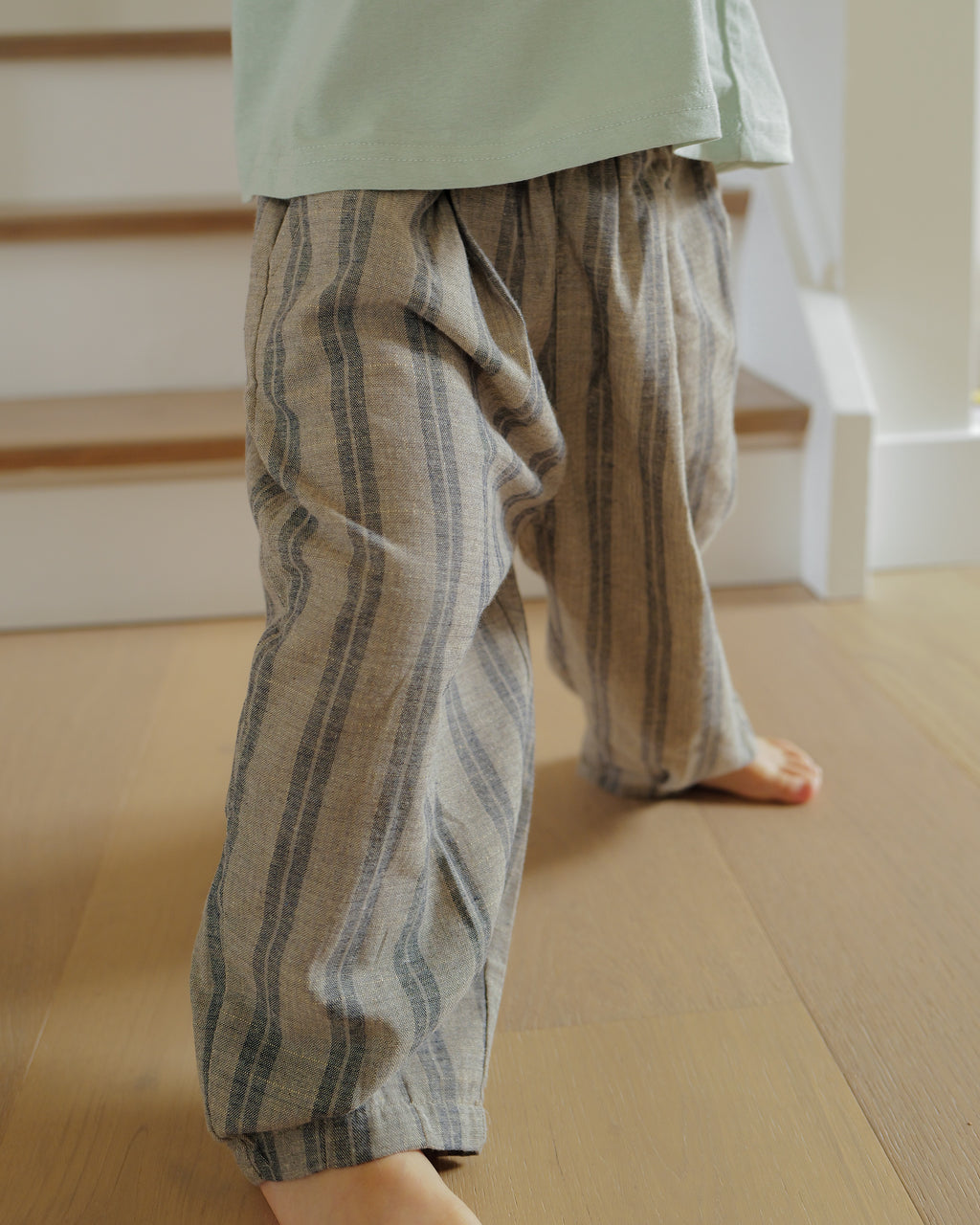 boy wearing tapered weave pant