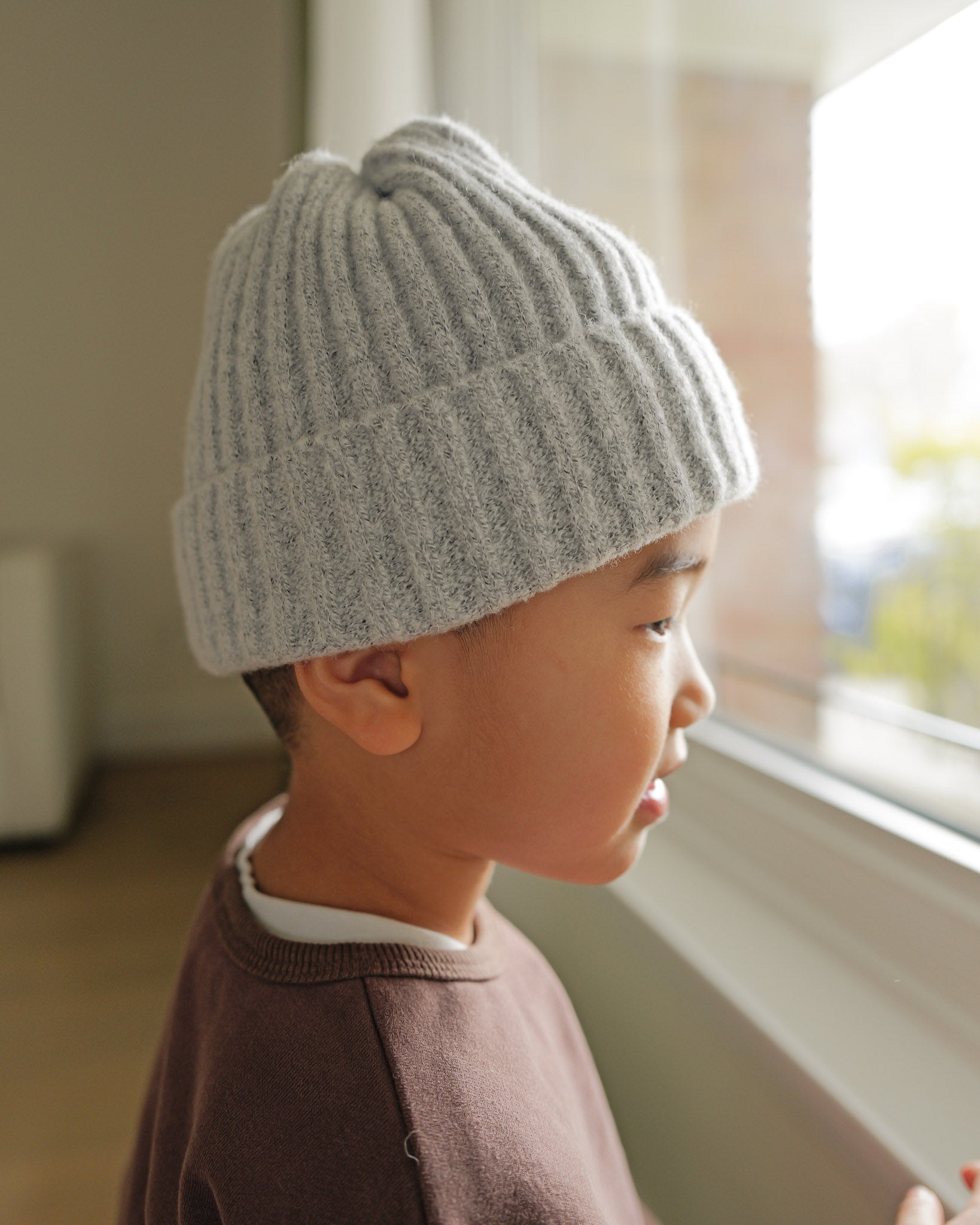 boy in grey knit beanie