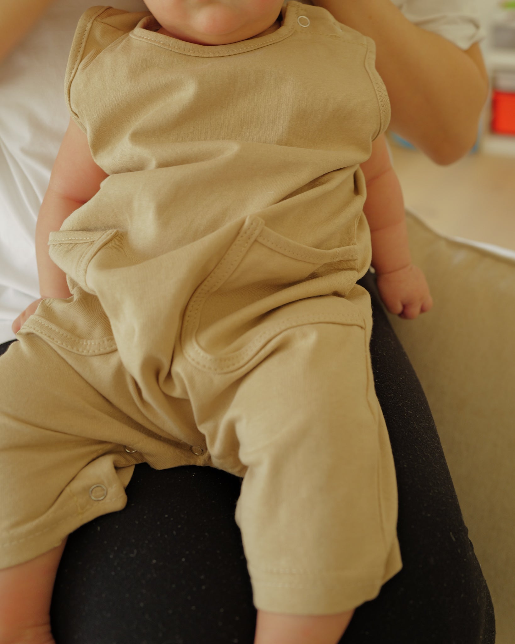infant in summer romper beige 2